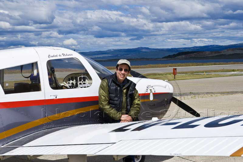 Peter Bryson with a single engine airplane